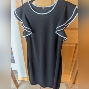 Elegant Black Dress with White Trim